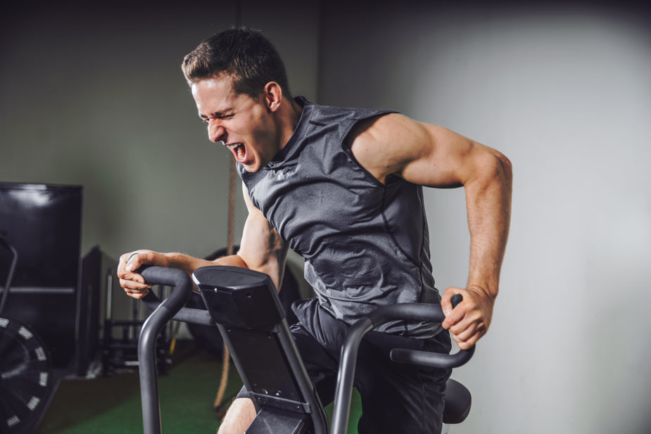 person running on a treadmill at high intensity (not focusing on steps a day)