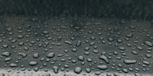 image shows rain drops on the floor