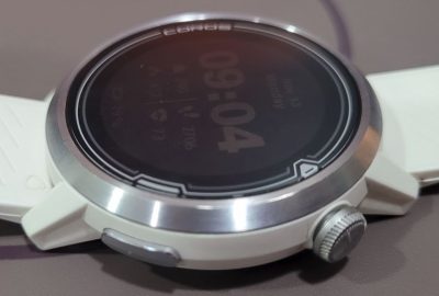 image shows coros watch face with button